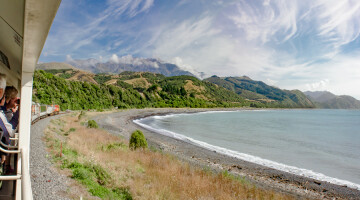 Train Coastal Pacific Skirting around Mangamaunu Bay RH0135 1000x500 v2